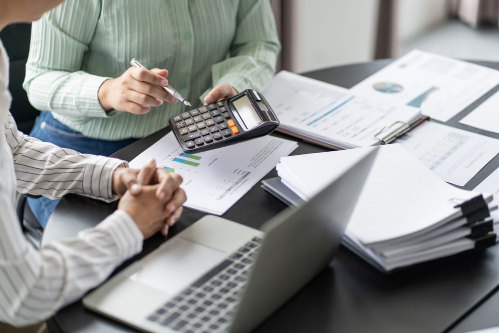 accountant checking annual financial statements of company